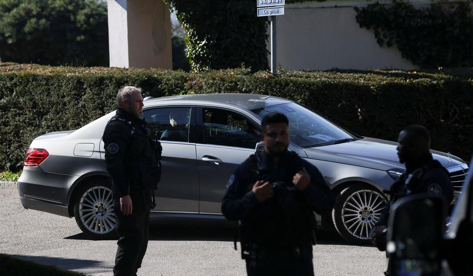A diplomatic car carrying an Iranian delegation drives near the residence of the Omani ambassador to the United Nations, in Cologny