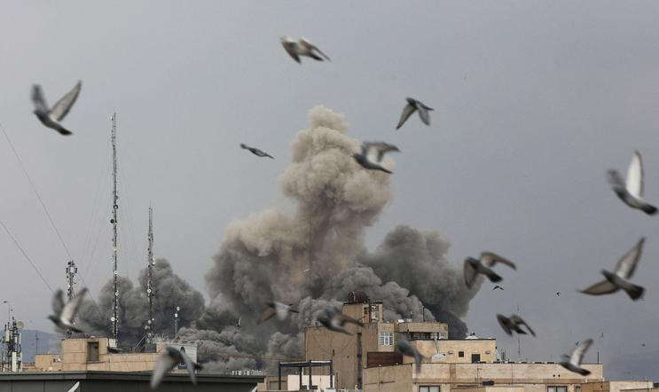 Smoke rises following an explosion, after Israel and the U.S. launched strikes on Iran, in Tehran