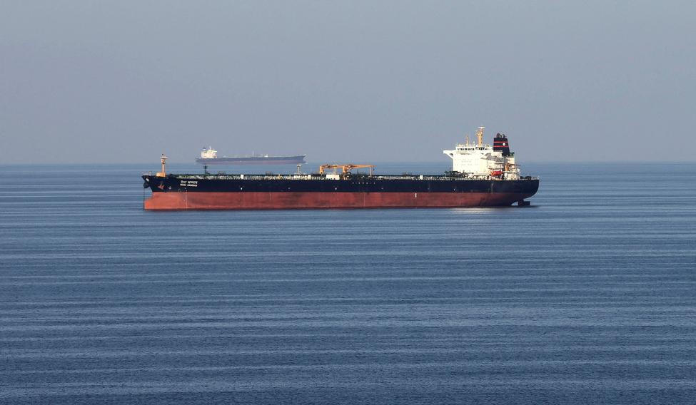 FILE PHOTO: Oil tankers pass through the Strait of Hormuz