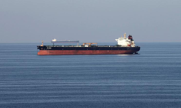 FILE PHOTO: Oil tankers pass through the Strait of Hormuz