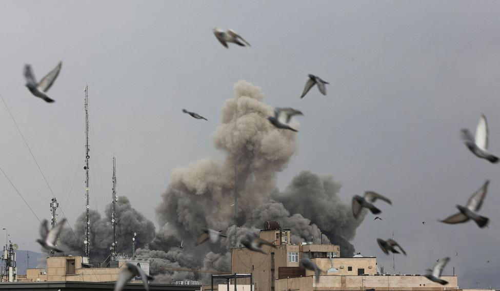 Smoke rises following an explosion, after Israel and the U.S. launched strikes on Iran, in Tehran