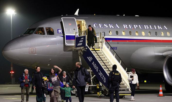 Czech citizens who were stranded in Jordan amid the U.S.-Israel conflict with Iran, arrive at Vaclav Havel Airport in Prague