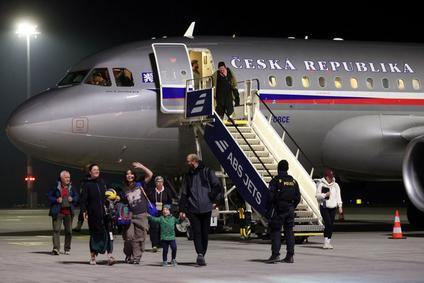 Czech citizens who were stranded in Jordan amid the U.S.-Israel conflict with Iran, arrive at Vaclav Havel Airport in Prague