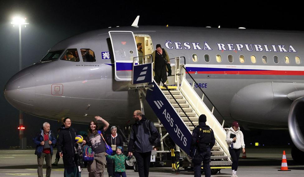 Czech citizens who were stranded in Jordan amid the U.S.-Israel conflict with Iran, arrive at Vaclav Havel Airport in Prague