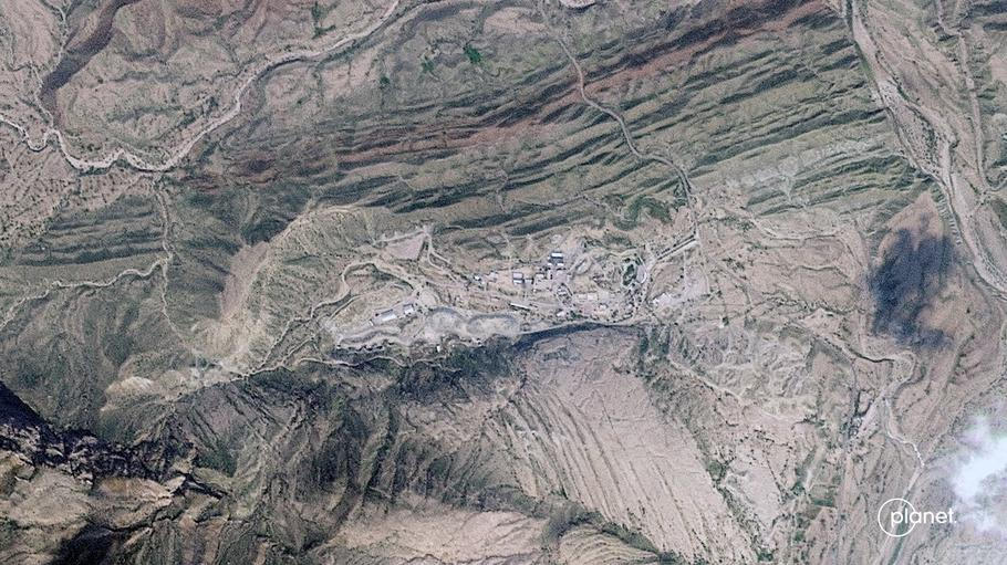 A satellite image shows damage at the Khorgu Missile Base