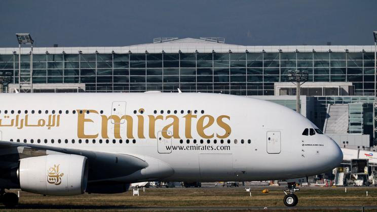 FILE PHOTO: An Emirates plane with German tourists evacuated from the Middle East arrives from Dubai, at the airport in Frankfurt