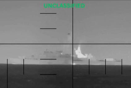 An explosion on what the U.S. Department of Defense says is an Iranian warship, at the sea