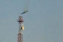 A burning aircraft falls from the sky in Al Jahra, in this still image obtained from social media video