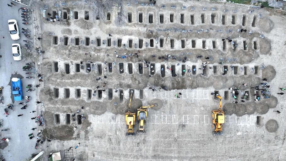 Graves are being prepared for the victims following a reported strike on a school in Minab