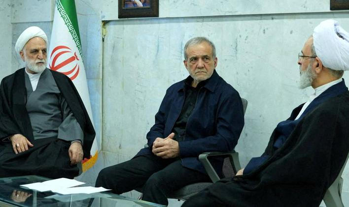 Iranian President Pezeshkian, Mohseni-Eje'i, and Arafi attend the meeting of the interim leadership council of Iran in an unknown location in Iran