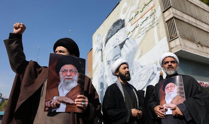 People attend an anti-Israeli and U.S rally in Tehran