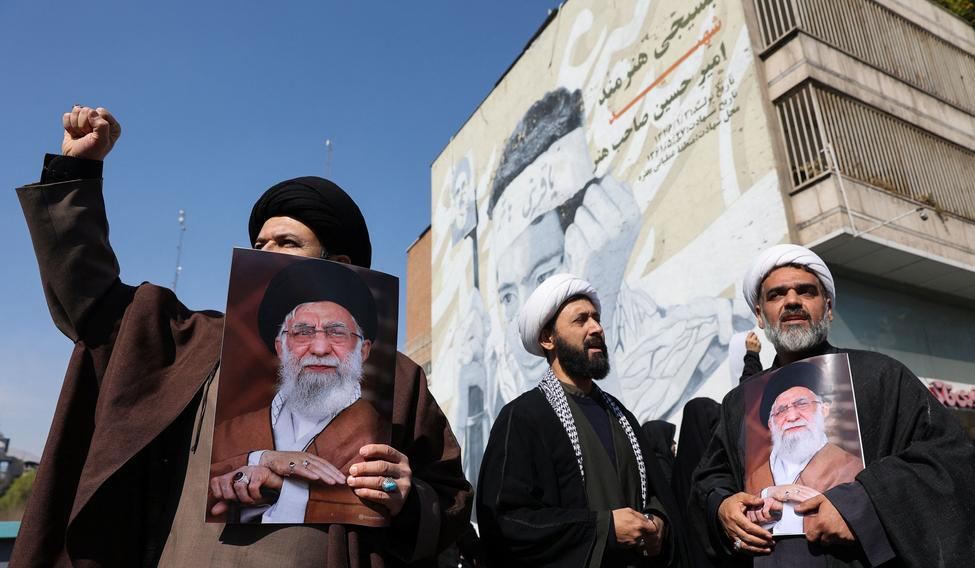 People attend an anti-Israeli and U.S rally in Tehran