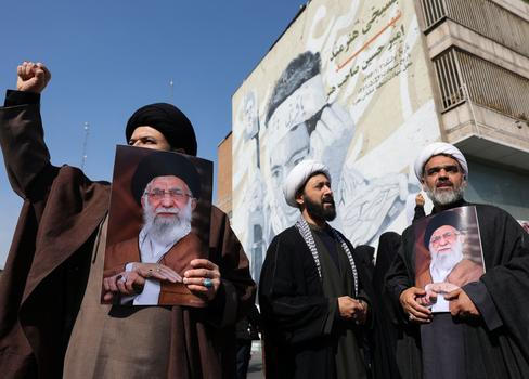 People attend an anti-Israeli and U.S rally in Tehran