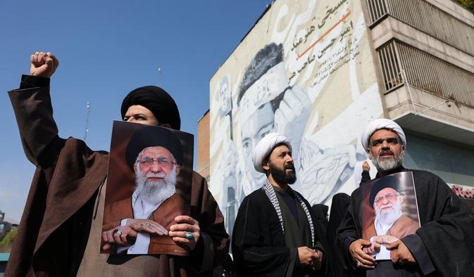 People attend an anti-Israeli and U.S rally in Tehran