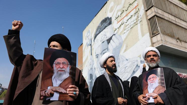 People attend an anti-Israeli and U.S rally in Tehran