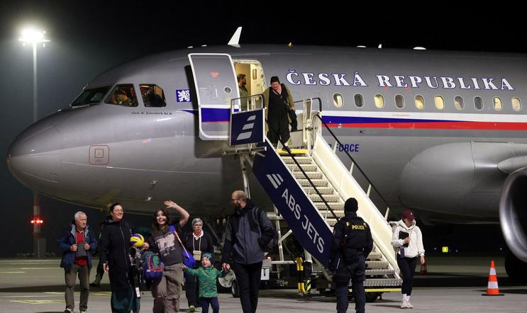 Czech citizens who were stranded in Jordan amid the U.S.-Israel conflict with Iran, arrive at Vaclav Havel Airport in Prague