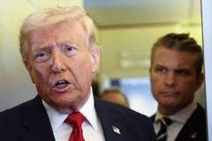 Trump speaks to reporters aboard Air Force One