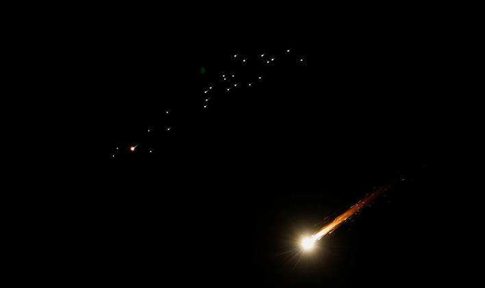 Iranian missiles fly towards Israel, as seen from Hebron
