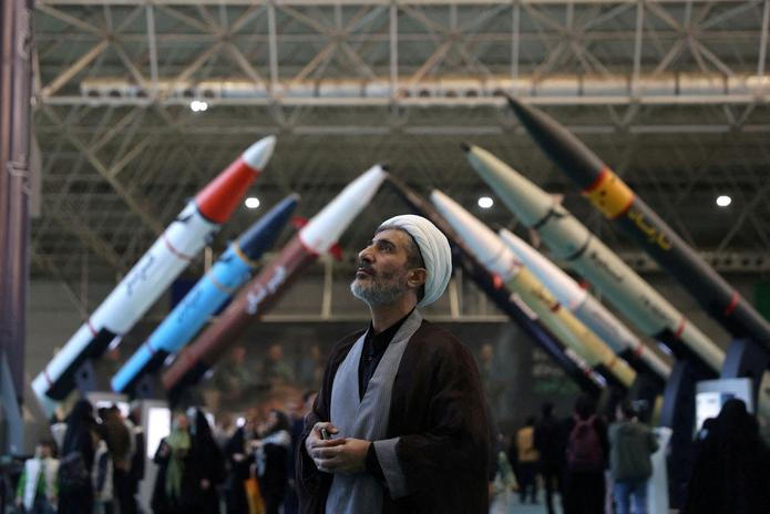 FILE PHOTO: An Iranian cleric visits the Islamic Revolutionary Guard Corps (IRGC) Aerospace Force Museum in Tehran