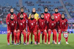 Iran players pose prior to the AFC Women’s Asian Cup Group A match between Iran and Philippines at Gold Coast Stadium
