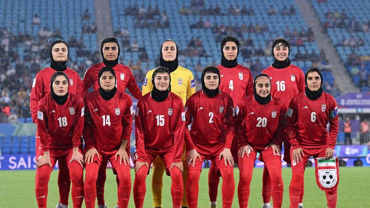 Iran players pose prior to the AFC Women’s Asian Cup Group A match between Iran and Philippines at Gold Coast Stadium