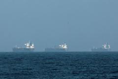 FILE PHOTO: Tankers are seen off the coast of the Fujairah amid the U.S.-Israel conflict with Iran