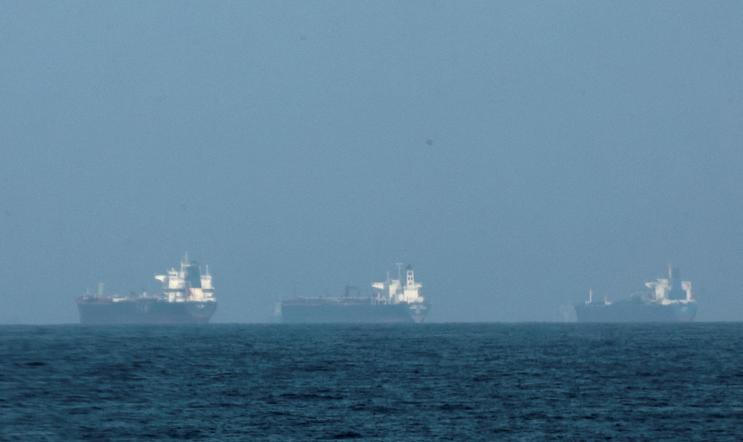 FILE PHOTO: Tankers are seen off the coast of the Fujairah amid the U.S.-Israel conflict with Iran