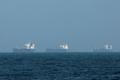 FILE PHOTO: Tankers are seen off the coast of the Fujairah amid the U.S.-Israel conflict with Iran
