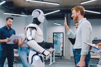 Multi-ethnic,Group,Of,People,Gathering,Together,To,Watch,Humanoid,Robot