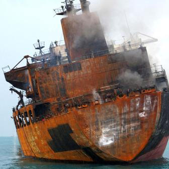 A foreign tanker carrying Iraqi fuel oil damaged after catching fire in Iraq's territorial waters, near Basra