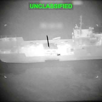 A projectile approaches what U.S. Central Command (CENTCOM) says is an Iranian naval vessel, during strikes that included attacks on mine-laying vessels, at a location given as near the Strait of Hormuz