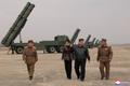 North Korean leader Kim oversees test-launch of multiple rocket launchers