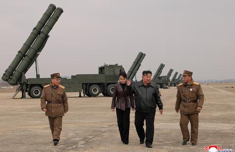 North Korean leader Kim oversees test-launch of multiple rocket launchers