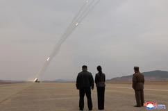 North Korean leader Kim oversees test-launch of multiple rocket launchers