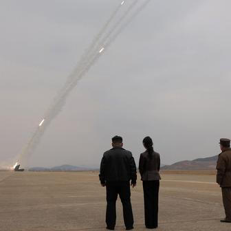 North Korean leader Kim oversees test-launch of multiple rocket launchers