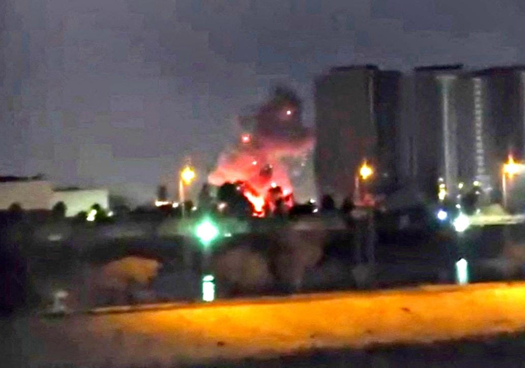 Smoke and fire rise during reported drone and rocket strikes at U.S. embassy in Baghdad
