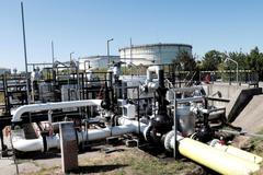 FILE PHOTO: The Druzhba oil pipeline between Hungary and Russia is seen at the Hungarian MOL Group's Danube Refinery in Szazhalombatta