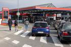 Vehicles queue at a petrol station in Ljubljana