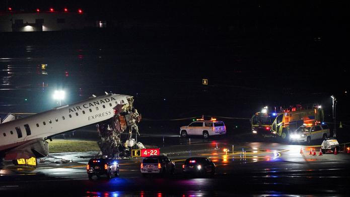 Air Canada Express jet collides with a ground vehicle at LaGuardia airport