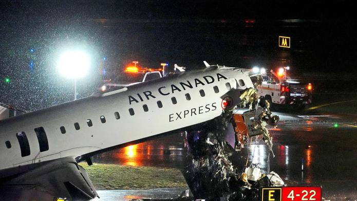 Air Canada Express jet collides with a ground vehicle at LaGuardia airport