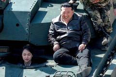 North Korean leader Kim Jong Un supervises what North Korean state news agency KCNA reports is an offensive tactical drill involving a new type of tank, at a training base in Pyongyang