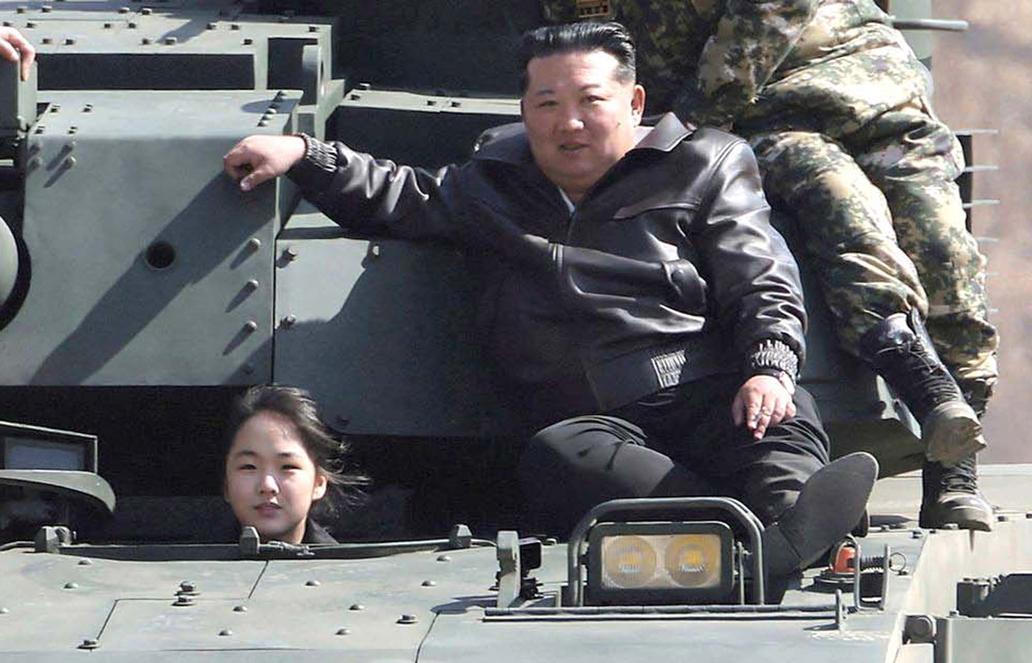 North Korean leader Kim Jong Un supervises what North Korean state news agency KCNA reports is an offensive tactical drill involving a new type of tank, at a training base in Pyongyang