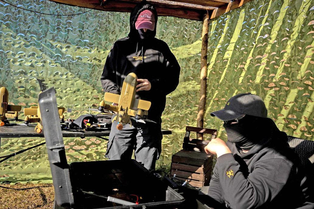 Wild Hornets engineers demonstrate Ukrainian Sting interceptor drones in Ukraine