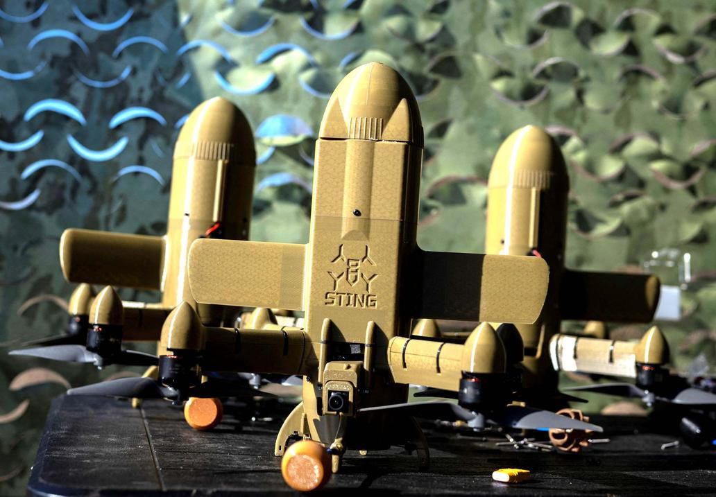 Wild Hornets engineers demonstrate Ukrainian Sting interceptor drones in Ukraine