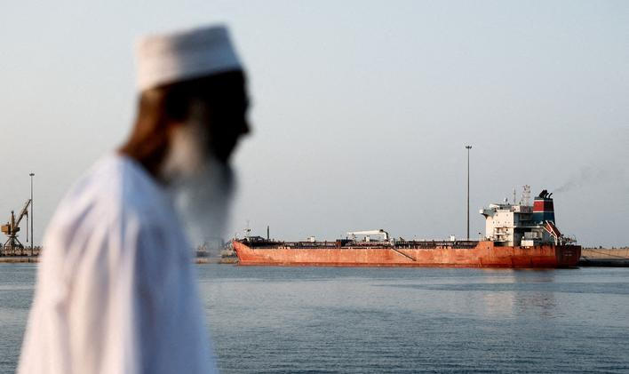 FILE PHOTO: The Callisto tanker sits anchored in Port Sultan Qaboos as the traffic is down in the Strait of Hormuz, in Muscat