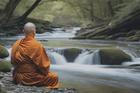 A,Buddhist,Monk,Observing,A,River,Flowing,Gently,,Practicing,Mindfulness,