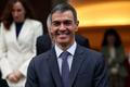 FILE PHOTO: Spain's PM Sanchez poses with members of the government for a family photo before their last cabinet meeting of the year at Moncloa Palace in Madrid