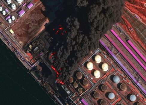 A satellite image shows smoke rising from Russia's Baltic port of Ust-Luga