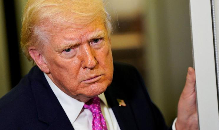 U.S. President Donald Trump on board Air Force One for travel to Joint Base Andrews