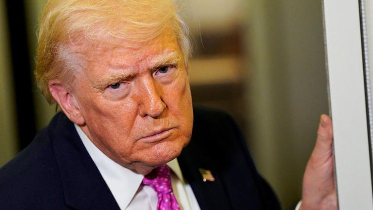 U.S. President Donald Trump on board Air Force One for travel to Joint Base Andrews